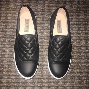 Black Steve Madden slip-ons